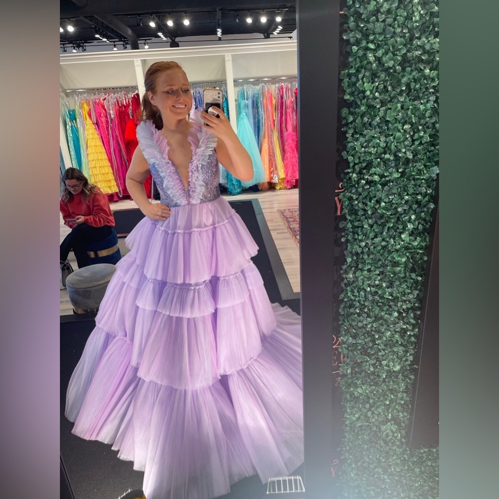 Ashley Lauren 11140 Tiered Ruffle Ball Gown in color lilac